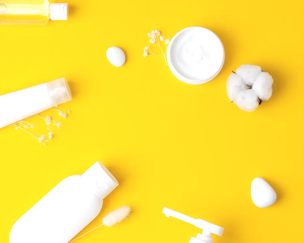 white skincare bottles and cream
